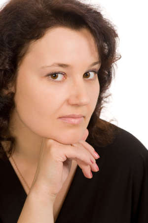 closeup portrait of the brunette woman on a white backgroundの写真素材