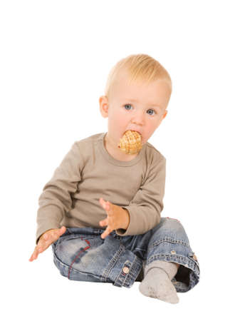 little boy play with shell. isolated on a white backgroundの写真素材