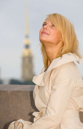 portrait of blond woman in historic center of Saint-Petersburg, Russiaの写真素材