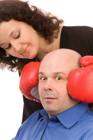 woman with boxing gloves and man on a white backgroundの写真素材