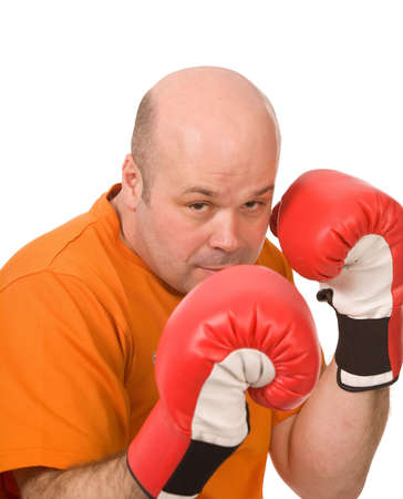 man with red boxing gloves on a white backgroundの写真素材