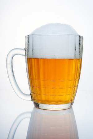 Russian Soviet beer mug with a cap of foam. Such beer mugs were all pubs Soviet Union.の写真素材