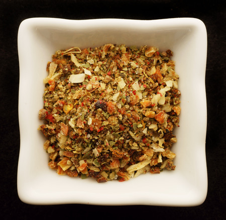 Spice in the ceramic bowl. Isolated on black.の写真素材