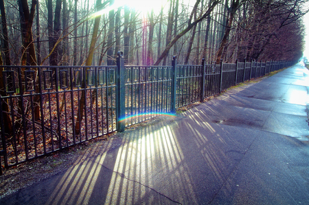 the fence of a Park in Moscow in the spring, the South-Western suburbsの写真素材