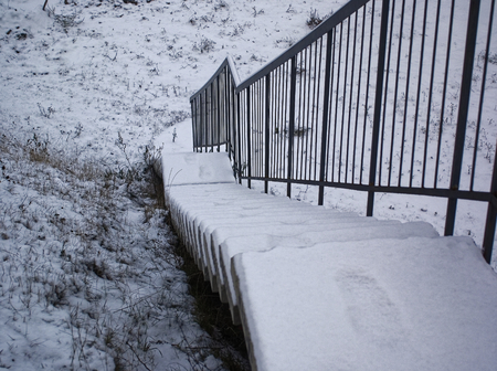 unfinished concrete staircase under snow, Moscow