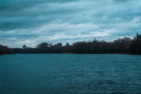 Riverbank on a cloudy spring morning
