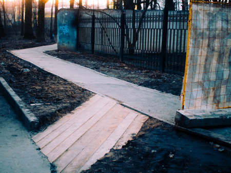fencing while repairing the pavement in the spring, Moscowの写真素材