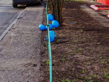 deflated balloons lie on the ground, Moscowの写真素材