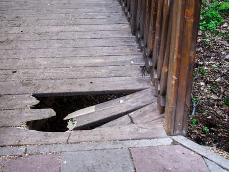 broken bridge in the park in springの写真素材