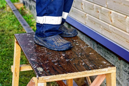finishing of the exterior wall of the village house, in summer
