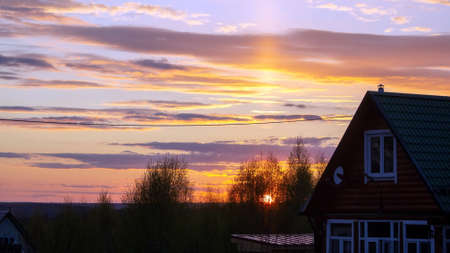 colorful sunset in the countryside, in summerの写真素材