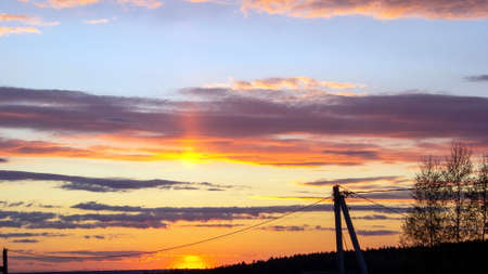 colorful sunset in the countryside, in summerの写真素材