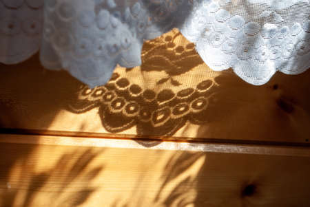shade from the curtain in a country house, in summerの写真素材