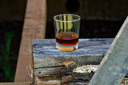 Clear glass with brown drink, in the villageの写真素材