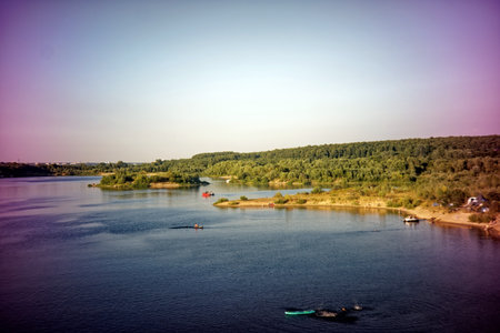 sandy bank of a small river, in summer