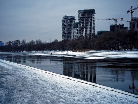 Embankment of the Moscow river in early spring, cloudy morning