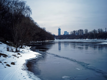 Embankment of the Moscow river in early spring, cloudy morning