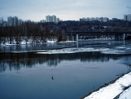 Embankment of the Moscow river in early spring, cloudy morning