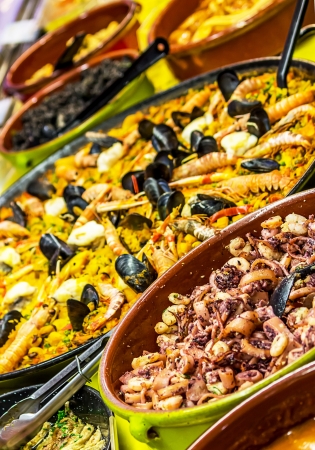 Paella and Calamari on displayの写真素材
