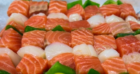 Raw salmon skewers for barbecueの写真素材