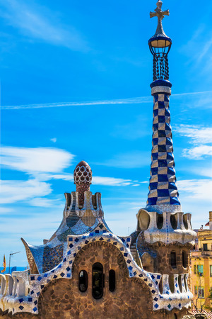 Colorful mosaic building designed by Antonio Gaudi in Park Guell Barcelona, Spainのeditorial素材