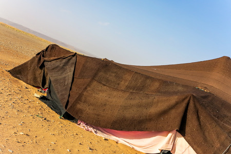 Brown Bedouin tent in the desert of Moroccoの写真素材
