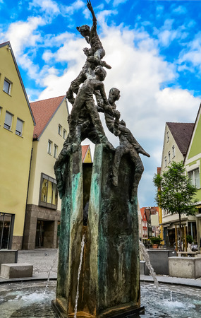 City fountain at the Fuchseck in Ellwangen, Baden-Wuerttemberg, Germanyの写真素材
