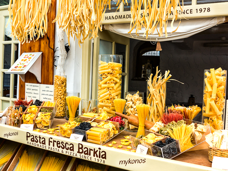 MYKONOS, GREECE-OCTOBER 03, 2015: Homemade Pasta Shop in Mykonos, Greeceのeditorial素材