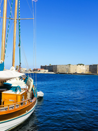 View of the historic Mandraki Harbour on the Iceland of Rhodes, Greeceの写真素材