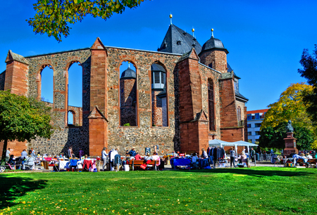 HANAU, GERMANY OCTOBER 14, 2017: Colorful flea market in front of the anti-war memorial church on a sunny October dayのeditorial素材