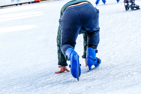 Learning ice skatingの写真素材