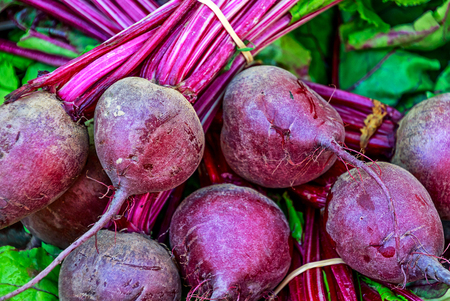 Fresh harvested tasty red beets with leaves