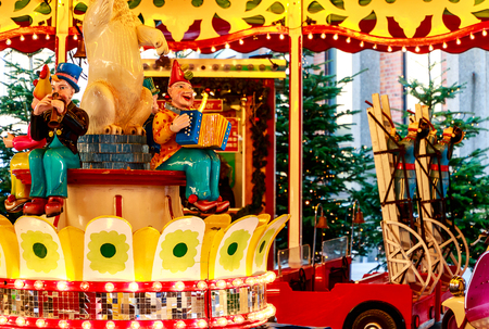 COLOGNE, GERMANY-DECEMBER 13, 2018: Carousel at the Christmas market in the front of the cathedralのeditorial素材