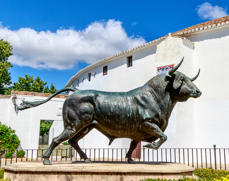 RONDA, SPAIN-SEPTEMBER 27, 2018: Bull sculpture - Ronda's main entrance to the bullring in historic fortress town? near Malaga, Andalusia, Spainのeditorial素材