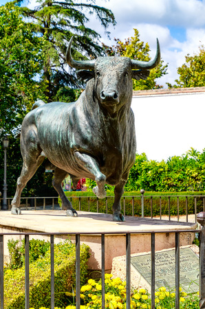 RONDA, SPAIN-SEPTEMBER 27, 2018: Bull sculpture - Ronda main entrance to bullring in historic fortress town? near Malaga, Andalusiaのeditorial素材