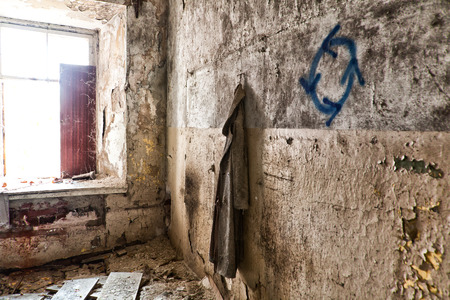 old coat in an abandoned house, sad to see dying old houseの写真素材