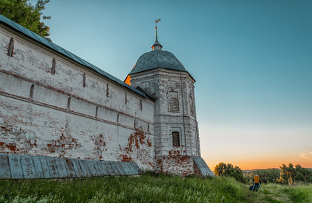 the unknown artist draws a picture at walls of the ancient monasteryの写真素材