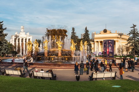 Moscow, Russia - October 4, 2015: Part of the Exhibition Center VDNH (VVC). The "Friendship of the People" fountain. In an image of gold girls 15 republics of the USSR are stylized.のeditorial素材