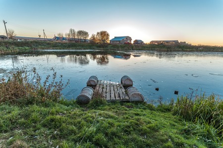 Pereslavl-Zalessky, Russia - October 20, 2015: Nikitsky Monastery, is founded in 1010. A monastic pond in the first ice.のeditorial素材
