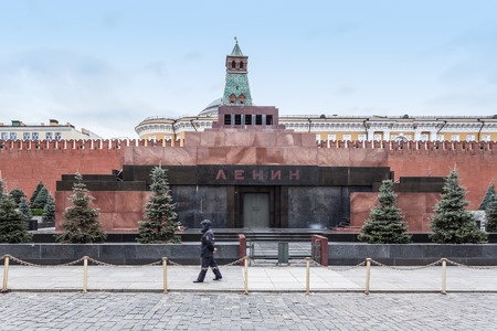 Moscow, Russia - October 14, 2015: Moscow Kremlin and Red Square. The Lenin Mausoleum on Red Square and the lonely police officer.のeditorial素材