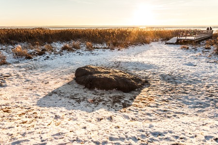 legendary blue stone - to it pagans worshipped and idolized one thousand years ago. Christians heated it in the lake, but it crept out on the coast itself in some years.の写真素材