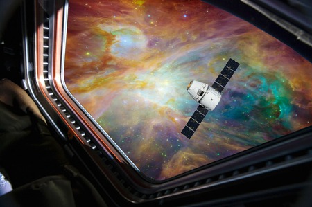 The dream of the person of space tourism has to come true. The tourist watches the satellite....
