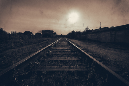 The train here won't come any more, rails handed over in scrap metal, the engine broke, the driver left.の写真素材