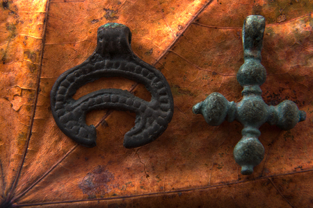 pagan lunnitsa and Christian cross of the eleventh century as symbols of change of religionの写真素材