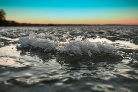 the last splash in a wave stopped a hard frost till next spring