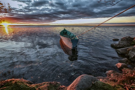 boat is torn in a declineの写真素材