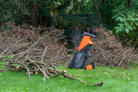 Branch and leaf shredder - garden electric mulch tool for soil fertilizationの写真素材
