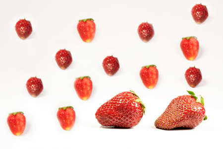 Red, juicy, ripe, strawberries on a white tableの写真素材
