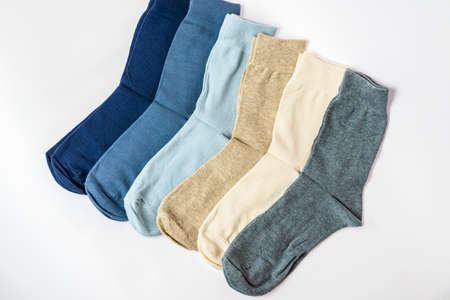 A stack of men's socks denim pastel colors.Isolateの写真素材