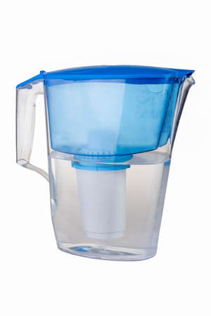 Transparent with blue cap filter jug for water purification. isolateの写真素材